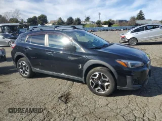 2018 Subaru Crosstrek Limited with VIN JF2GTAMC1JH306824, listed as a Copart auction lot 87843525 with 72,456 mi miles and Salvage title. Bid and sale history available at DreamBid. Image 4.