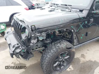 2021 Jeep Wrangler Sport with VIN 1C4GJXAN5MW627228, listed as a IAAI auction lot 42170010 with 56,965 mi miles and . Bid and sale history available at DreamBid. Image 6.