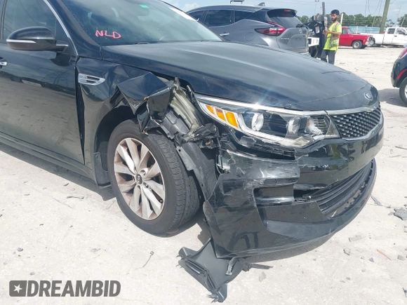 2017 Kia Optima EX with VIN 5XXGU4L35HG164578, listed as a IAAI auction lot 42646046 with 71,113 mi miles and . Bid and sale history available at DreamBid. Image 6.