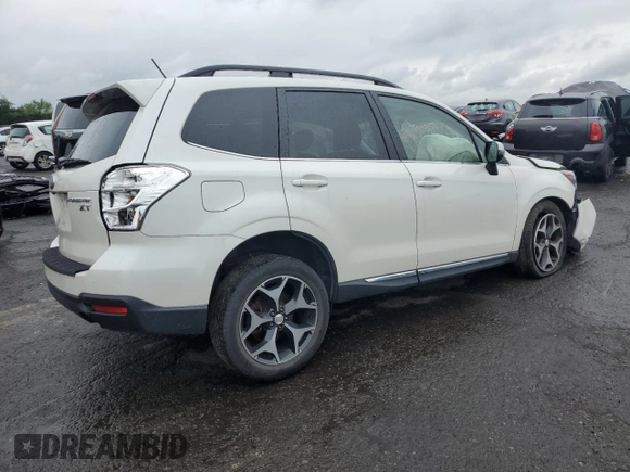 2015 Subaru Forester XT Touring с VIN JF2SJGUC5FH526588, выставлен на аукционе Copart как лот 62583825 с пробегом Не указан миль и Списание • Salvage title. История ставок и продаж доступна на DreamBid. Изображение 3.