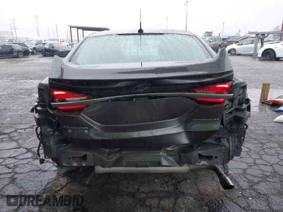2017 Ford Fusion Titanium with VIN 3FA6P0SU8HR329570, listed as a IAAI auction lot 41773023 with 112,022 mi miles and . Bid and sale history available at DreamBid. Image 17.
