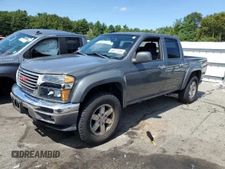 2012 GMC Canyon SLE2 with VIN 1GTH6PFE5C8138412, listed as a Copart auction lot 69271264 with 89,100 mi miles and Salvage Title. Bid and sale history available at carsss.com. Image 1.