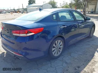 2018 Kia Optima LX with VIN 5XXGT4L31JG268493, listed as a IAAI auction lot 41965277 with 97,458 mi miles. Bid and sale history available at carsss.com. Image 4.