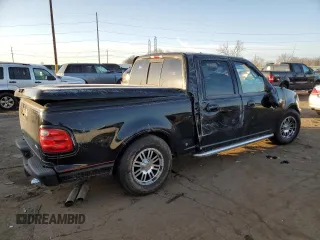 2001 Ford F-150 SuperCrew XLT with VIN 1FTRW07L71KA04123, listed as a Copart auction lot 48477755 with 128,808 mi miles and Clean Title. Bid and sale history available at carsss.com. Image 3.