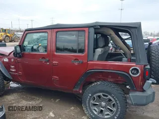 2007 Jeep Wrangler Unlimited Sahara with VIN 1J4GA59177L162022, listed as a IAAI auction lot 41887599 with 207,358 mi miles and . Bid and sale history available at DreamBid. Image 13.