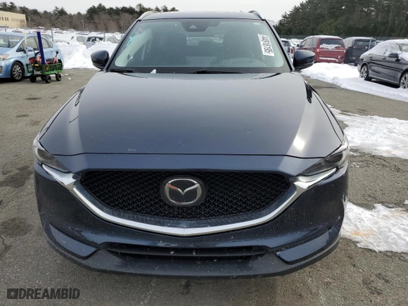 2021 Mazda CX-5 Grand Touring with VIN JM3KFADM6M0367976, listed as a Copart auction lot 44916195 with 50,500 mi miles and Salvage Title. Bid and sale history available at carsss.com. Image 5.