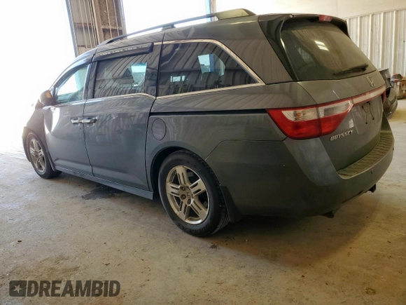 2012 Honda Odyssey Touring с VIN 5FNRL5H94CB049626, выставлен на аукционе Copart как лот 61191435 с пробегом 199 728 миль миль и Списание • Salvage title. История ставок и продаж доступна на DreamBid. Изображение 2.