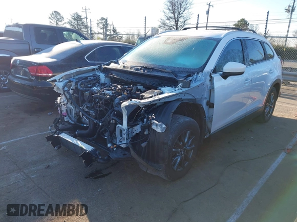 2021 Mazda CX-9 Touring with VIN JM3TCACY4M0522302, listed as a IAAI auction lot 41323543 with 35,223 mi miles and . Bid and sale history available at DreamBid. Image 20.