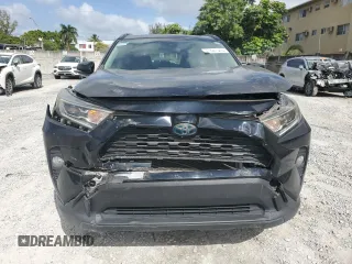 2019 Toyota RAV4 Hybrid XLE with VIN JTMRWRFV3KD020929, listed as a Copart auction lot 51827345 with 79,991 mi miles and Non Repairable. Bid and sale history available at carsss.com. Image 5.