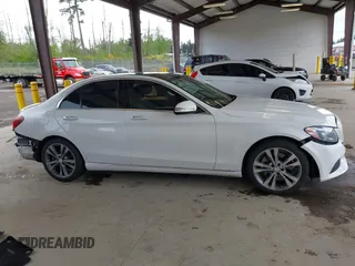 2015 Mercedes-Benz C 300 Luxury with VIN 55SWF4KB6FU023015, listed as a IAAI auction lot 42153797 with 47,639 mi miles and . Bid and sale history available at carsss.com. Image 14.