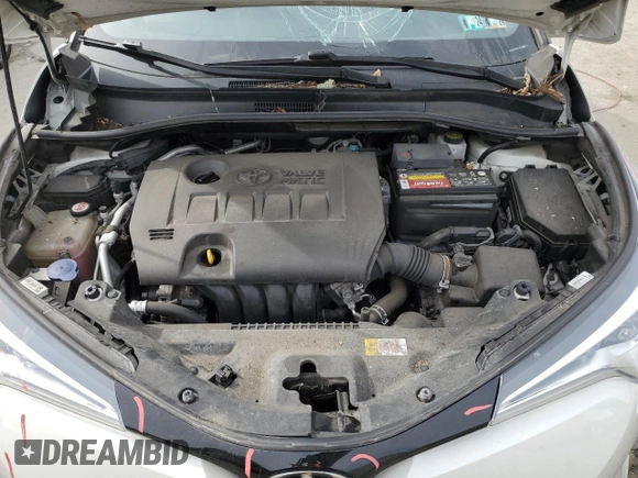 2019 Toyota C-HR XLE z VIN NMTKHMBX7KR073500, wystawiony jako Copart lot #53596395 z przebiegiem 91 934 mil mil oraz Szkoda całkowita • Salvage title. Historia ofert i sprzedaży dostępna na DreamBid. Obrazek 12.