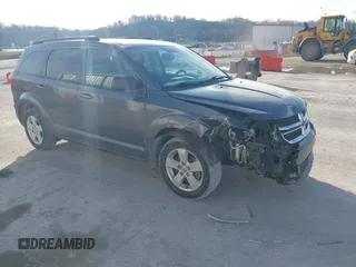 2014 Dodge Journey SE with VIN 3C4PDCAB0ET283756, listed as a IAAI auction lot 41490472 with 122,695 mi miles. Bid and sale history available at carsss.com. Image 1.