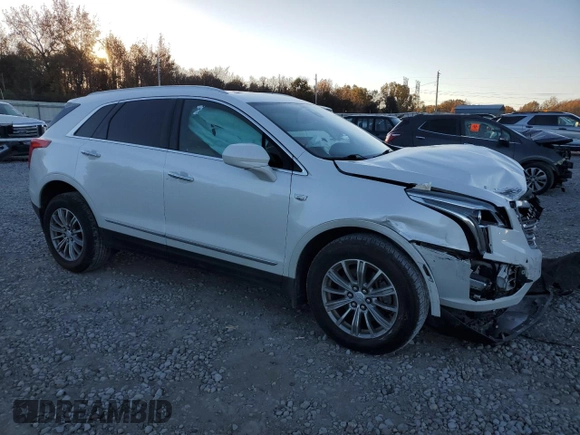 2017 Cadillac XT5 Luxury FWD with VIN 1GYKNBRS0HZ196145, listed as a Copart auction lot 83430344 with 143,012 mi miles and Salvage title. Bid and sale history available at DreamBid. Image 4.