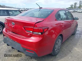 2020 Kia Rio LX with VIN 3KPA24AD4LE295817, listed as a IAAI auction lot 41759598 with 79,509 mi miles and . Bid and sale history available at DreamBid. Image 4.