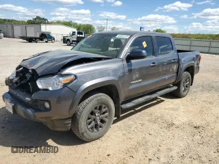 2020 Toyota Tacoma SR5 z VIN 5TFAZ5CN0LX093399, wystawiony jako Copart lot #52302225 z przebiegiem 116 694 mil mil oraz Szkoda całkowita • Salvage title. Historia ofert i sprzedaży dostępna na DreamBid. Obrazek 1.