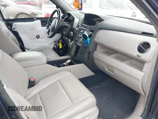 2012 Honda Pilot EX-L with VIN 5FNYF4H52CB070811, listed as a IAAI auction lot 41938672 with 156,446 mi miles and . Bid and sale history available at DreamBid. Image 5.