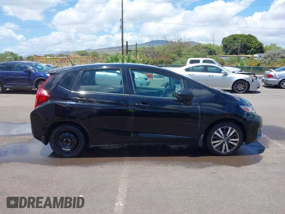 2015 Honda Fit EX-L with VIN 3HGGK5H88FM739107, listed as a IAAI auction lot 42193170 with 56,243 mi miles and . Bid and sale history available at DreamBid. Image 14.