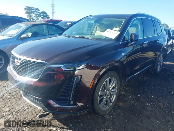 2021 Cadillac XT6 Premium Luxury with VIN 1GYKPDRS7MZ133561, listed as a IAAI auction lot 41112365 with 73,956 mi miles. Bid and sale history available at carsss.com. Image 17.
