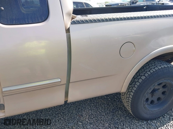2001 Ford F-150 XL z VIN 1FTRX18WX1NA13022, wystawiony jako IAAI lot #41954491 z przebiegiem 126 284 mil mil oraz . Historia ofert i sprzedaży dostępna na DreamBid. Obrazek 6.