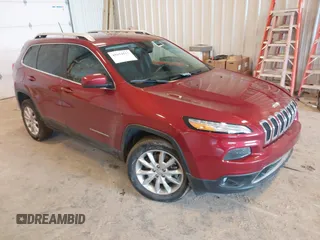 2014 Jeep Cherokee Limited z VIN 1C4PJMDB5EW237604, wystawiony jako IAAI lot #41694117 z przebiegiem 95 959 mil mil oraz . Historia ofert i sprzedaży dostępna na DreamBid. Obrazek 1.