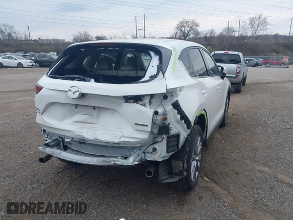 2020 Mazda CX-5 Grand Touring with VIN JM3KFBDM5L0731373, listed as a IAAI auction lot 41900567 with 31,268 mi miles and . Bid and sale history available at DreamBid. Image 6.