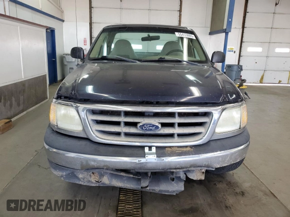 2003 Ford F-150 XL with VIN 1FTRF17293NA60031, listed as a Copart auction lot 55433885 with 186,557 mi miles and Salvage title. Bid and sale history available at DreamBid. Image 5.