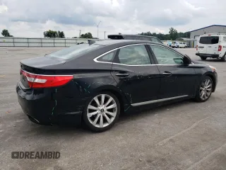 2013 Hyundai Azera with VIN KMHFH4JGXDA198345, listed as a Copart auction lot 58256945 with 102,711 mi miles and Salvage title. Bid and sale history available at DreamBid. Image 3.