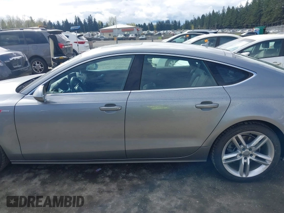 2014 Audi A7 Premium Plus z VIN WAUWGAFC4EN160144, wystawiony jako IAAI lot #41970181 z przebiegiem 118 761 mil mil oraz . Historia ofert i sprzedaży dostępna na DreamBid. Obrazek 14.