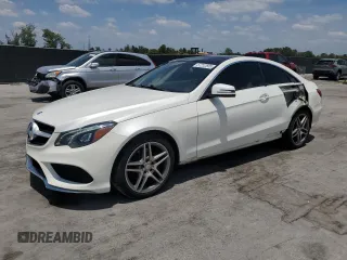2016 Mercedes-Benz E 400 with VIN WDDKJ6HB0GF334931, listed as a Copart auction lot 57212655 with 94,136 mi miles and Salvage title. Bid and sale history available at DreamBid. Image 1.