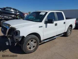2007 Ford F-150 XLT with VIN 1FTPW12517KD34256, listed as a IAAI auction lot 41828504 with 163,516 mi miles. Bid and sale history available at carsss.com. Image 2.