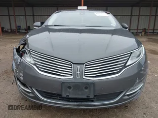 2015 Lincoln MKZ z VIN 3LN6L2G99FR604894, wystawiony jako IAAI lot #41433264 z przebiegiem 262 472 mil mil oraz . Historia ofert i sprzedaży dostępna na DreamBid. Obrazek 13.