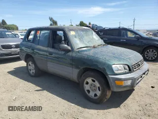 1999 Toyota RAV4 with VIN JT3GP10V9X7044726, listed as a Copart auction lot 55180935 with 196,509 mi miles and Salvage Title. Bid and sale history available at DreamBid. Image 4.