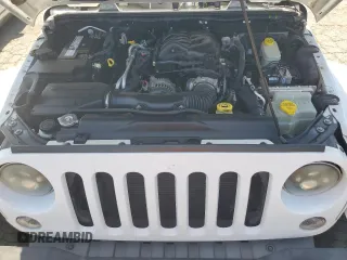 2015 Jeep Wrangler Rubicon Hard Rock z VIN 1C4BJWCG5FL561397, wystawiony jako Copart lot #61218185 z przebiegiem 164 240 mil mil oraz Czysty tytuł • Clean title. Historia ofert i sprzedaży dostępna na DreamBid. Obrazek 11.