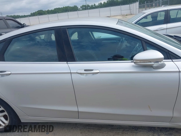 2016 Ford Fusion SE z VIN 3FA6P0H72GR296906, wystawiony jako IAAI lot #42571597 z przebiegiem 242 623 mil mil oraz . Historia ofert i sprzedaży dostępna na DreamBid. Obrazek 13.