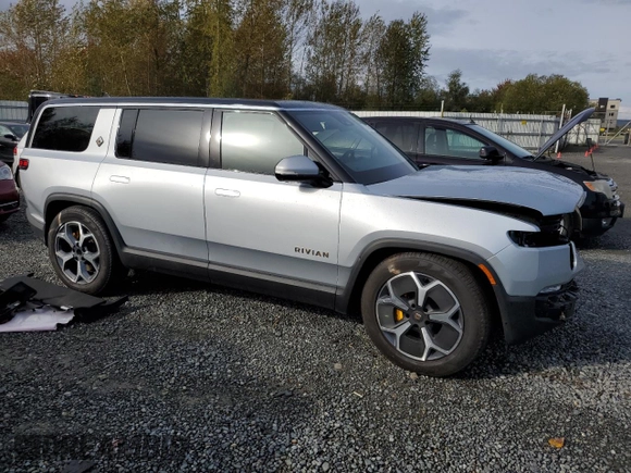 2023 Rivian R1S Adventure z VIN 7PDSGABAXPN019516, wystawiony jako Copart lot #73248104 z przebiegiem 11 525 mil mil oraz Szkody całkowita. Historia ofert i sprzedaży dostępna na DreamBid. Obrazek 4.
