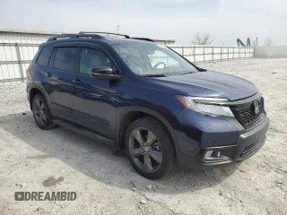 2021 Honda Passport Touring with VIN 5FNYF8H99MB042984, listed as a Copart auction lot 52858975 with 35,308 mi miles and Salvage title. Bid and sale history available at DreamBid. Image 4.