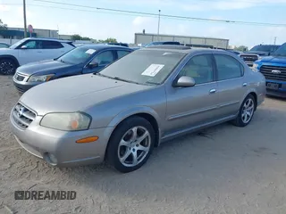 2003 Nissan Maxima GLE z VIN JN1DA31A83T411224, wystawiony jako IAAI lot #41905714 z przebiegiem Nie podano mil oraz . Historia ofert i sprzedaży dostępna na DreamBid. Obrazek 21.