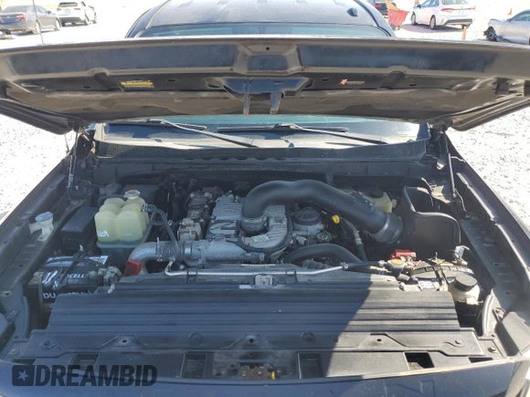 2016 Nissan Titan SL z VIN 1N6BA1F4XGN509402, wystawiony jako Copart lot #52410795 z przebiegiem 37 421 mil mil oraz Szkoda całkowita • Salvage title. Historia ofert i sprzedaży dostępna na DreamBid. Obrazek 11.