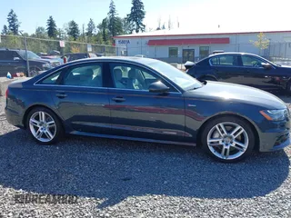 2015 Audi A6 Premium Plus with VIN WAUFGAFC9FN003498, listed as a IAAI auction lot 42652995 with 53,880 mi miles and . Bid and sale history available at DreamBid. Image 13.