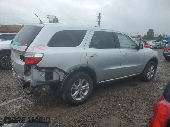 2012 Dodge Durango SXT with VIN 1C4RDJAG4CC106273, listed as a Copart auction lot 59767205 with 223,098 mi miles and Salvage title. Bid and sale history available at DreamBid. Image 3.