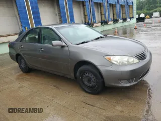 2006 Toyota Camry STD z VIN 4T1BE32KX6U724706, wystawiony jako Copart lot #59139525 z przebiegiem 168 693 mil mil oraz Czysty tytuł • Clean title. Historia ofert i sprzedaży dostępna na DreamBid. Obrazek 4.
