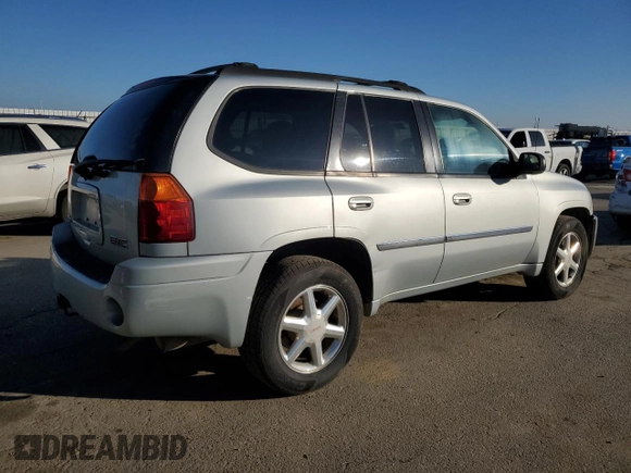 2007 GMC Envoy SLE with VIN 1GKDS13S872156921, listed as a Copart auction lot 41433705 with 194,587 mi miles and Salvage Title. Bid and sale history available at carsss.com. Image 3.