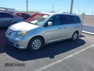 2008 Honda Odyssey EX-L with VIN 5FNRL38758B008724, listed as a IAAI auction lot 42202383 with 199,977 mi miles and . Bid and sale history available at DreamBid. Image 2.