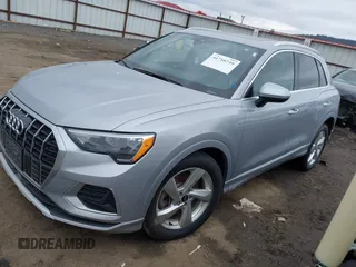 2021 Audi Q3 Premium with VIN WA1AUCF35M1131933, listed as a IAAI auction lot 41710739 with 93,293 mi miles and . Bid and sale history available at DreamBid. Image 2.