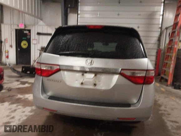 2012 Honda Odyssey LX with VIN 5FNRL5H27CB092988, listed as a IAAI auction lot 41933507 with 123,233 mi miles and . Bid and sale history available at DreamBid. Image 17.
