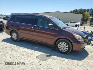 2010 Honda Odyssey LX z VIN 5FNRL3H25AB004652, wystawiony jako Copart lot #54923025 z przebiegiem 335 312 mil mil oraz Szkoda całkowita • Salvage title. Historia ofert i sprzedaży dostępna na DreamBid. Obrazek 4.