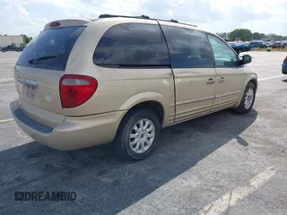 2001 Chrysler Town & Country LXi with VIN 2C8GP54L71R146624, listed as a IAAI auction lot 41767162 with 78,458 mi miles and . Bid and sale history available at DreamBid. Image 4.
