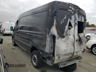 2024 Ford Transit Cargo with VIN 1FTBR1C86RKA98779, listed as a Copart auction lot 70473944 with 35 mi miles and Salvage Title. Bid and sale history available at DreamBid. Image 2.