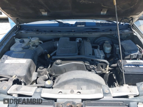 2003 GMC Envoy SLT with VIN 1GKDS13S732150215, listed as a IAAI auction lot 42048209 with 329,719 mi miles. Bid and sale history available at carsss.com. Image 10.
