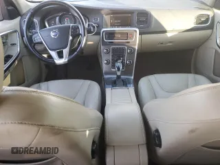 2015 Volvo V60 z VIN YV1612SB6F1211119, wystawiony jako Copart lot #77466004 z przebiegiem 144 388 mil mil oraz Szkoda całkowita • Salvage title. Historia ofert i sprzedaży dostępna na DreamBid. Obrazek 8.